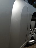 Vehicle dent repaired with paintless dent repair by Collins Dent Werks in Fife Lake Michigan