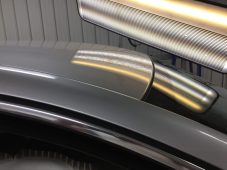 Vehicle roof after hail dent repair using paintless dent repair at Collins Dent Werks in Fife Lake, Michigan