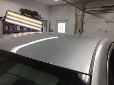 Vehicle roof after hail dent repair using paintless dent repair at Collins Dent Werks in Fife Lake, Michigan