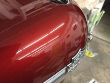Finished paintless dent repair on a Harley-Davidson motorcycle fuel tank at Collins Dent Werks in Fife Lake, Michigan
