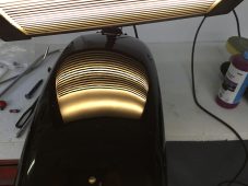 Finished Honda Rebel motorcycle fuel tank after paintless dent repair by Collins Dent Werks in Fife Lake, Michigan