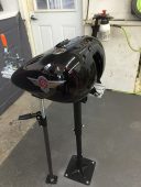 Completed paintless dent repair on a Harley-Davidson motorcycle fuel tank at Collins Dent Werks in Fife Lake, Michigan