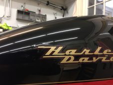 Harley-Davidson motorcycle fuel tank after paintless dent repair in Fife Lake, MI by Collins Dent Werks