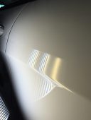 Smooth body panel on a Jeep after paintless dent repair completed in Fife Lake, Michigan